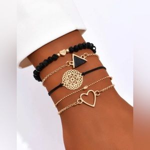 NWT Set of 5 Black and Gold Colored Bracelets